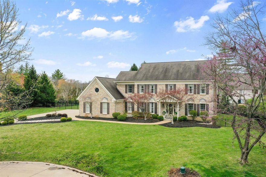 From the drive up along the charming picket-fenced Wilson Rd, to the immaculate neighborhood, and the cozy position of this property at the end of a serene cul-de-sac; this move-in-ready home in Wilson Manor boasts one of the best floor plans in the neighborhood. Once the "model home", the current owners have made this 5 bd, 3f /2h bath home a true showplace. Just some of the features include: 9’ ceilings, elegant moldings, spacious library & dining, family room with beamed ceilings, hardwood floors, gas fireplace, and a cozy 3-season room and deck. The open, center island kitchen features newer appliances, large pantry, and granite counters. Mudroom with laundry adjacent to car collect-worthy 3-car garage. Upstairs hosts huge primary bedroom suite with vaulted ceiling, plus 4 additional bds, & remodeled hall bath. Finished LL with fireplace, bar, full bath, bonus room, and lots of storage. Large, flat lot has nice combination of wooded and open areas with room for expansion. Additional Rooms: Mud Room