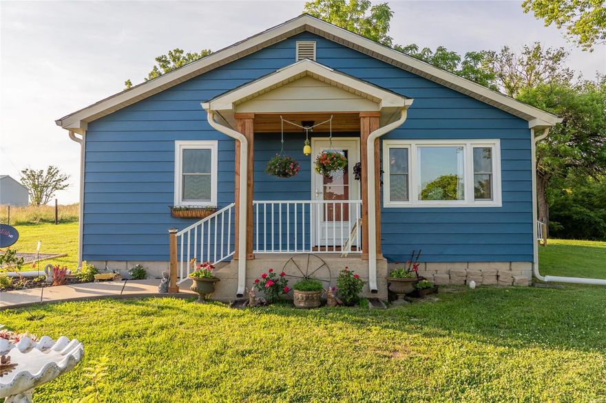 This home features lots of original charm with all the updates you expect in a high-end home.  3 bed 2 bath home on  2.6 acres just outside of town. Private setting.  Home has been completely updated. Some original hardwood floors and luxury vinyl plank floor. Master bedroom and master bath feel like something right out of a magazine.  Brand new custom kitchen with cherry butcher block, farmhouse kitchen sink and large island.  French doors take you to the side multi-level deck.  Outbuilding for storage and chicken coop. Roof is 5 years old.  New HVAC system, hot water heater and windows.  Maintenance free metal siding. If you are looking for class and charm this is THE ONE for you.