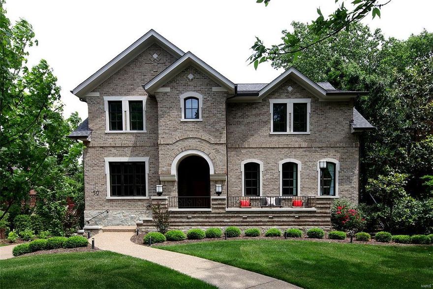 Welcome to this remarkable home with exceptional architectural details throughout.10 ft ceilings, crown molding, oak floors, glass panel staircase and custom wooden doors. Gracious entry offers an expansive view of great room with fireplace & quartz surround. Lg dining room with arched windows, tray ceiling and wainscoting. Study has coffered ceiling with built-in library and tall glass doors. Hallway powder room is impeccably designed. Kitchen is high end with Wolff/ Subzero/ Asko appliances quartz counters, walk-in pantry, 54" Gegg cabinetry &  butler's pantry with dishwasher and beverage refrigerator. Cheerful sunroom off kitchen with custom glass sliding doors and fireplace leads to lg deck. 2nd floor has luxury master suite with 2 lg walk-in closets, BainUltra bath and lg sitting room with fireplace. Remaining 3 bedrooms all have ensuite baths. LL has 5th bedroom with bath, media area and full kitchen that opens to a patio. Attention to detail in this newer home is a rare find.