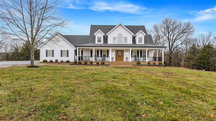 This home is the total package! 4 Beds 3.5 baths set atop 11+ park-like acres offering gorgeous views a 40x50 pole barn & the perfect mix of open & wooded ground. This 1.5 story home has been expanded & tastefully updated throughout! The front porch is so inviting, plenty of space to relax & enjoy the peaceful views. The main floor boasts gleaming hardwood floors and an impressive vaulted great room. The kitchen is a chef & entertainers dream with a massive island and multiple ovens ready for you to cook a feast! The butlers pantry offers 2 additional customizable refrigerator/freezers. The owner’s suite with his & hers closets & a fabulous bathroom is conveniently located on the main floor. Upstairs you will find 3 generously sized bedrooms & full bath. The walkout basement is equipped with a theater room, rec space, workout room, full bath & a wet bar. Out back you'll find a massive patio & maintenance free decking overlooking the open yard space leading to acres of wooded privacy.