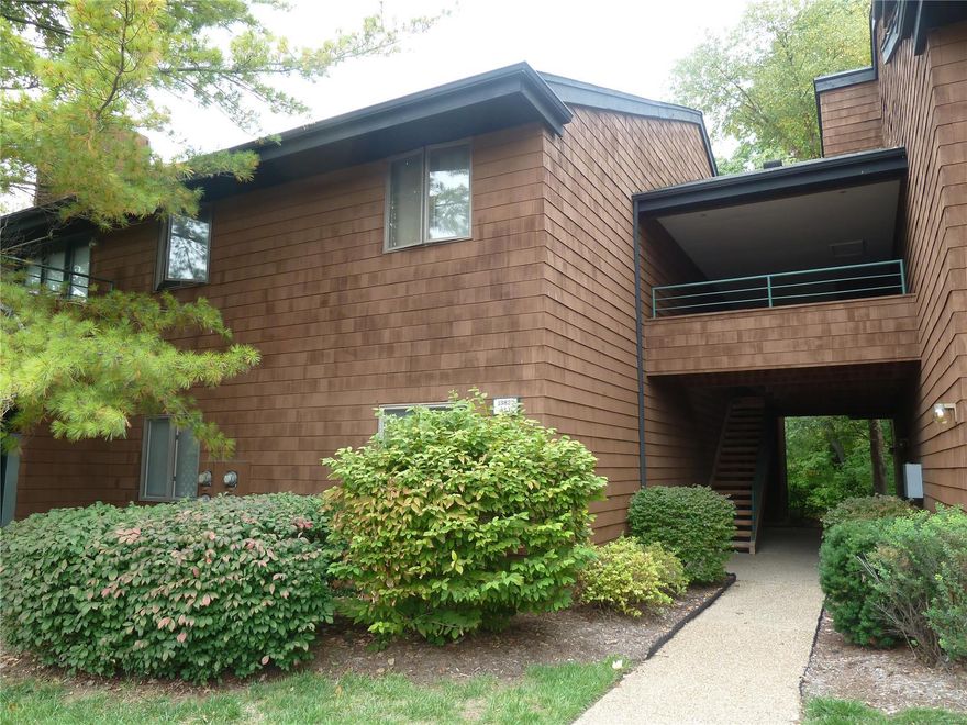 Top floor 2 bed, 2 full bath condo in a fantastic location is now available for purchase!  Enter the living room with wood burning fireplace for the cold winters ahead.  Walk out to the balcony that overlooks a tranquil wooded area.  The kitchen has plenty of cabinet space and is tucked right behind the dining room.  Master bedroom has it's own full bath and the second good sized bedroom has another full bath right across the hallway.  Washer and dryer are also in the unit and stay with all other appliances!  New HVAC installed Sept 2019!  One car detached garage plus one assigned parking space. Creve Coeur Park is just minutes down the road as well as all that Olive has to offer, and quick access to Hwy 40/64 and 364. Don't forget the community pool available to cool off in the summer.  This one will not last long! Location: Upper Level