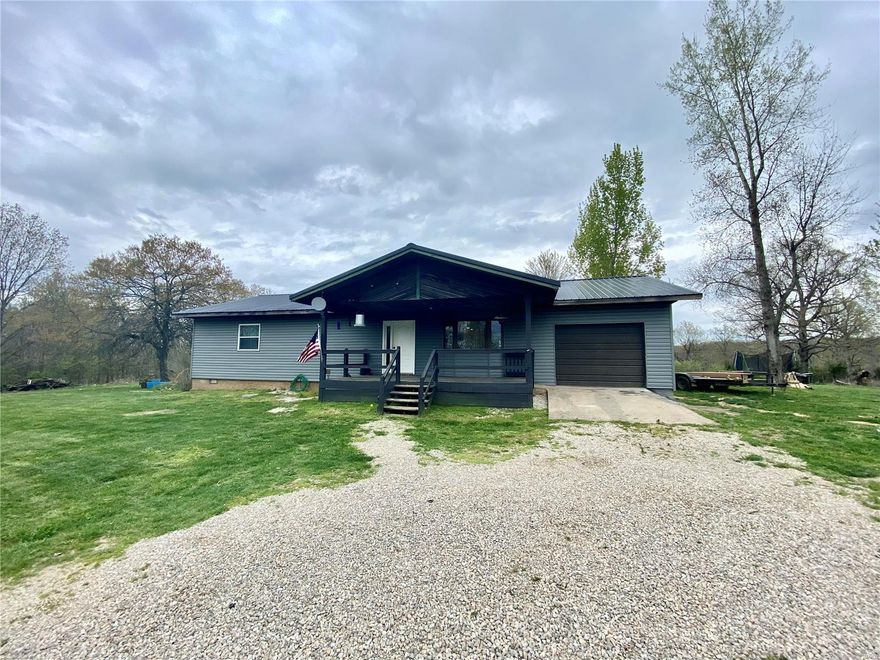 This is one you're going to have to see to appreciate! Gorgeous renovated home on 1.37 acres in the country! You'll love the customizations in this three bedroom, two bath home! Stunning hardwood and ceramic tile flooring, custom wood doors and trim, creative and eccentric touches throughout! Home has brand new roof, siding and gutters as well that match the spacious 30x40 full spray foam insulated shop outside. Home is complete with a covered front porch and breathtaking 20x20 gable covered patio in the back with Edison lights for ambiance. You won't want to miss taking a look at this one! Give us a call today to see if this could be your next home!