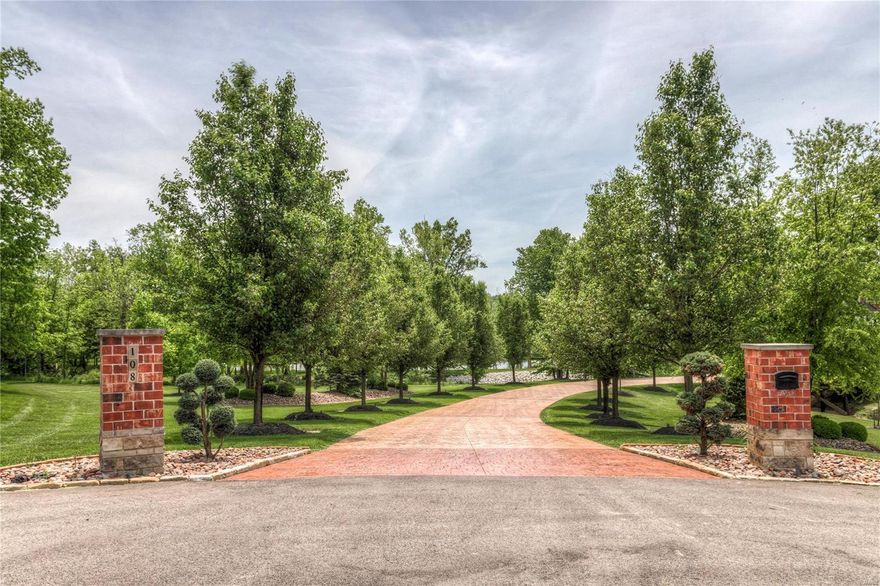 $200K price drop! Exquisite Estate home nesteld on a secluded 10 acre parcel of Heaven just 30 min to St Louis Airport. A total of 8000 plus sq feet of sheer luxury! Prvt 2 acre lake, totally manicured grnds with full lake fed irrigation, 8 car garaging and magnificent pool deck and outside covered entertainment areas with amazing lake & open ground views. Custom home w/ energy efficient Geo Thermal ground source multi zoned HVAC, 2 stry entry and grt rm, 30' x 17' mn  floor mstr br & 20' x 15' mstr bath, 30' x 13' upper lvl Prince/Princess suite as well as 2 additional br's each with prvt baths along w/ upper sitting and loft areas. Other main flr rms incld;  family and guest sized fully eqipped kitchen, large formal dining rm all with quality hrd woods & ceramic flrng. Venture dn to the fabulous w/o LL w/ 10' ceilings, bar area, family & rec areas, steam rm, exercise rm, theatre rm, 5th br & 6th bth rm. Back yrd is football, baseball & golf ready! Duplicate listing of MLS 19054730.