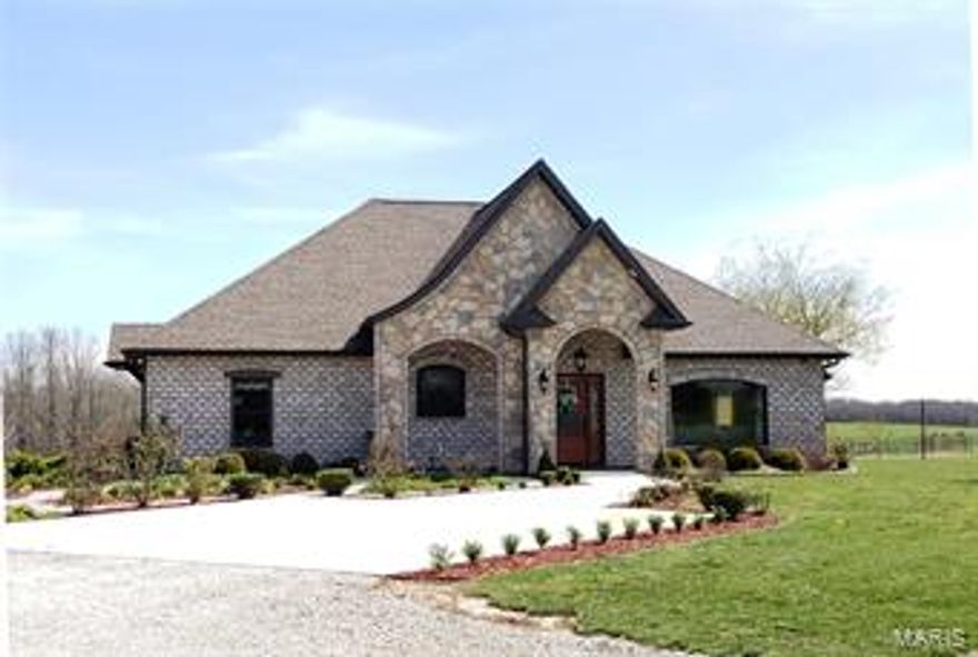 Exceptional 327+/- acre property offers perfect ranching opportunities, Gated entry leads to a 3BD/2BA custom French Country style home.  Working ranch set up for intensive grazing, most recently very successful registered Angus cattle operation running 100+/- cow-calf pairs.  30 Fenced pastures. 2+/- miles piped water. 270+/- open acres. Bottom field for row crops. 3+/- springs, stocked lake. 3240+/- sqft shop, 12x70 covered equip storage area, 12x72 lean to equipment shed. 18x15 finished office, 40x104 clear span hay barn with inside cattle working area. Arrow Catch squeeze chute/scale. Outside equip storage area. 2nd set lighted working pens, auto waterers set up throughout property. Features of the Home: Custom hardwood cabinets, low E Quaker wood windows, fireplace with marble surround, stained hardwood doors, plasters walls, large island with seating and prep sink, Copper farmhouse style sing, granite counter tops, tile back splash.  See Attached Brochure.