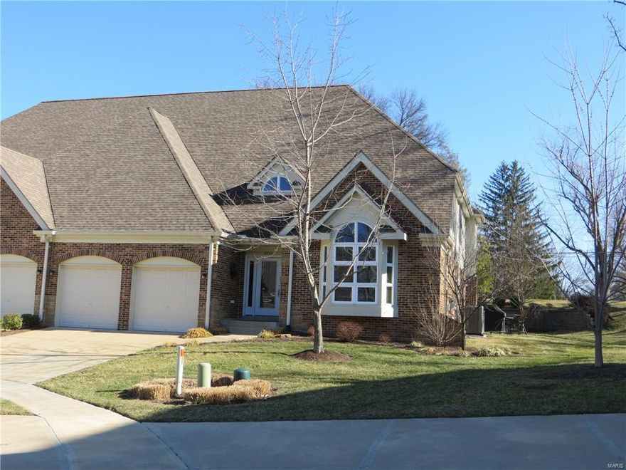 Bright, Beautiful & Tastefully appointed w/Premium Upgrades throughout this Light & Airy 3 Bedroom Villa with one of the Larger Lots in the development. 9' Ceilings, Crown Molding, 5.25" Baseboards, Vaulted Ceilings, Skylights, Floor to Ceiling Windows in the GreatRm surround the Gas Fireplace w/Traditional Wood Mantle. Open Floor Plan offers a Main Floor MasterBdrm w/Coffered Ceiling, 3.25" Wood Flooring & Walk-In Closet. Master Bathroom Suite w/Solid Surface-Adult Height Counter top, His & Hers Sink, Double Linen Closet, Open Walk-In Shower. Office/Study Area, Wood Staircases, GE Stainless Steel Appliances, Solid Counter tops w/Large Custom Serving Area, Pantry, Custom Cabinetry that adjoins a Formal Separate Dining Room.  Loft Area overlooks the GrtRm & Offers some Privacy for your Guests!  There are 2 Concrete Patios - 1 on the Side of the property and 1 at the Rear, along with a Smaller Coffee/Wine Deck directly off the Great Room!  Walk-Out Bsmt has a 8'6" height. See it Today!!! Location: End Unit, Ground Level