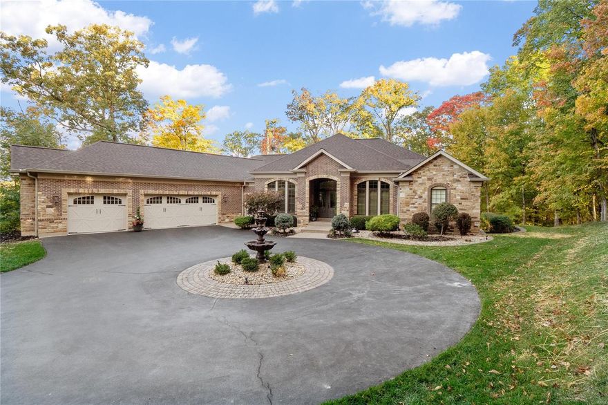 Exquisitely built custom ranch home featuring a saltwater pool & professionally designed interior w/gorgeous finishes throughout! The grand foyer welcomes you home, flanked by a remodeled office & formal dining room. Showstopping great room offers expansive windows that frame the backyard, one of the home's two gas fireplaces, & stunning 10' box beam ceiling. The gourmet kitchen hosts stainless appliances, custom cabinetry, large island, bar & more. The gorgeous hearth room leads to the incredible backyard boasting a pool, poolside cabana & stone fire pit surrounded by woods. The main floor primary suite features coffered ceilings, large soaking tub, walk-in shower, spacious walk-in closet, & double sinks. Convenient laundry room, additional bedroom & full hall bath complete the main floor. Grand staircase leads to the lower level, offering a rec room, half bath, exercise room, & two bedrooms share a full bathroom. Don't miss the opportunity to visit this stunning home!