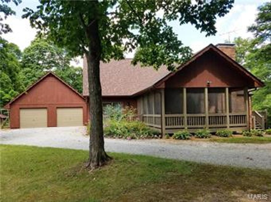 Custom Built 3 bedroom, 2 Full & 2 Half Bath, 1.5 story home on 13.55+/- acres offers a private country setting and 2,250 Sq. Ft. Total Finished Living Area.  New roof, gutters and screens in Nov. 2015.  Over-sized detached 2 car garage. Screened in front porch (furniture stays).  Main floor laundry.  6 panel doors throughout home.  Spacious master-suite provides a peaceful retreat with gorgeous views out the back windows and spacious walk-in closet.  Master bath has separate shower & whirlpool tub.  Geo-thermal heating and cooling system for very economical utility bills.  Family room includes gas fireplace and sliding glass doors to wrap around deck.  Finished lower level walkout features a brick surround wood burning fireplace with firewood inserts.  Tax records are based on previous home. This home was totally rebuilt in 1996 and square footage is higher than tax records state. Make your appointment today.