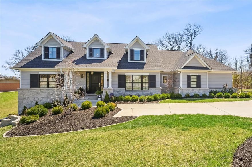 This spectacular 1.5-sty Cape Cod from award-winning Kennerly Custom Homes redefines luxury living. Open floor plan features detailed trim work, designer lighting & oak hardwoods that extend throughout the main floor. Vaulted foyer leads to beautifully appointed dining room and stunning great room with box beam ceiling, wet bar, cast stone fireplace flanked by built-in display cases & dramatic wall of windows. State-of-the-art kitchen with 46” white cabinetry, marble countertops, commercial grade appliances, 9’ center island & butler’s pantry adjoins breakfast room & light-filled family room with cathedral ceiling & entertainment center. Primary bedroom suite with marble bath with freestanding tub offers an appealing retreat. Hardwood floors continue to the 2nd level with 3 additional bedrooms, 1 with ensuite bath & 2 with Jack n’ Jill bath. Lower Level includes recreation room, workout room & full bath. Atrium door opens to outdoor living area with pool & flagstone patio with firepit. Additional Rooms: Mud Room, Sun Room