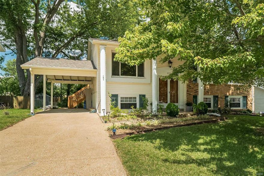 Beautiful home in Parkway South! Hardwood floors throughout the main floor. Main floor has an updated bathroom with quartz countertops. Downstairs is a living room, another bedroom or whatever else you would like to use it as and a full bathroom which is nicely updated. You could choose upstairs or downstairs for the master bedroom. Freestanding fireplace in the lower level living room. Great back yard with a greenhouse. 1 covered carport space. Home is available immediately. Owner would prefer no pets but would consider 1 dog up to 30 pounds.