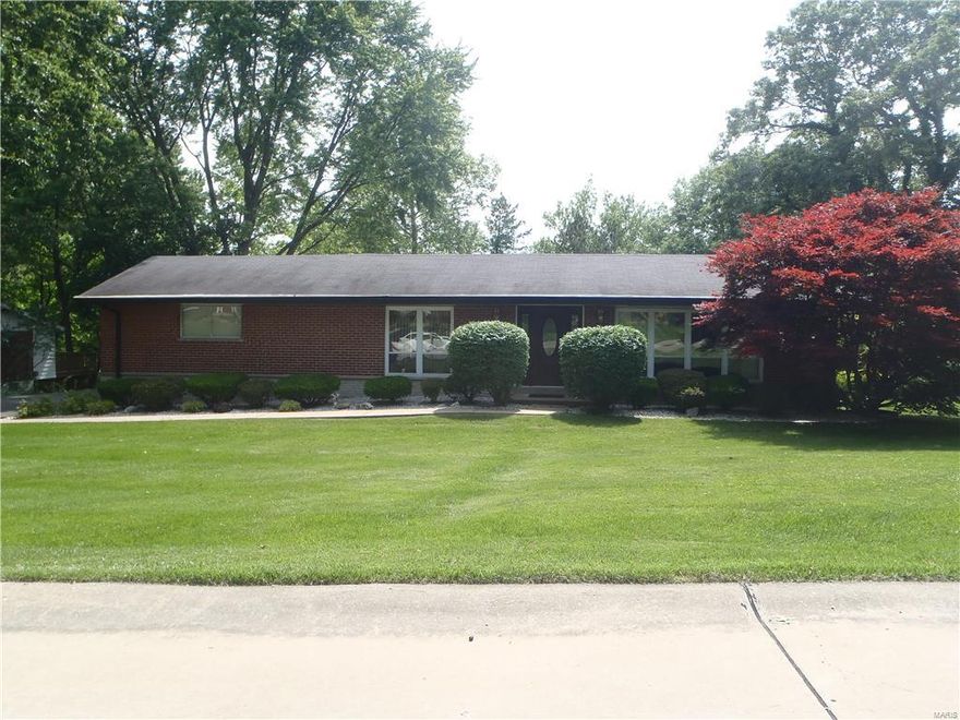 Spacious brick and vinyl ranch. This lovingly cared for home is waiting for its new family. You will appreciate the wood floors in the living and dining room and kitchen. Eat in kitchen. Many hours will be enjoyed in the family room. The lower level has a rec. room with a dry bar and game room, cedar closet and extra storage. The men will enjoy the 3 car garage. Quiet cul-de-sac. Furnace and  a/c were purchased 7/2014, carpet in master bedroom May, 2016. All windows were replaced but the master bedroom and kitchen.  Seller had the Unincorporated inspection. Professional landscaped yard on a corner lot.  
 Washer, dryer & refrigerator stay but "as is." Must see!