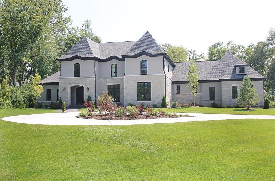 Winner of design awards, this new luxury home has a recently completed outdoor entertaining area w/custom gunite pool (w/waterfalls & fire bowls), integrated spa, stainless/granite kitchen, pergola, & stone firepit on a custom turf grid. The meticulously crafted 6000 sqft (not counting finished bsmt) offers a large mstr bedroom boasting a “Bath of the Year – Platinum” bath and access to a private courtyard. 1st floor also has 2 half baths, beautiful paneled office, large wainscoted dining room, & spacious mudroom. The amazing beamed great room, unique island breakfast banquette, & chef’s kitchen were featured in St. Louis H&L magazine. BONUS - a private guest apartment accessed from the mudroom includes a living room, kitchen, full bath, laundry, bedroom w/view, & walk-in closet. 2nd floor has open play area, 4 bedroom each w/full bath, & laundry. Bsmt 10’ tall w/entertaining room, full bath, fitness room, secure vault room, optional bedroom. Bsmt storage accessible via 4 car garage. Additional Rooms: Mud Room COOL: 14 SEER+