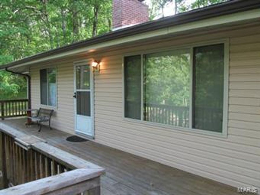 Large Price Reduction! Great country retreat and comes partly furnished. Home haqs fireplace in living room. Front windows extend out to look on large deck. Great size eat-in kitchen that goes out to sun porch. Home sits close to Gasconade River but not in flood plain.Property is set up for full time living but would be great for weekend get a way. There is another small guest cabin on property for family and friends. Very welcoming for some relaxation. Additional Rooms: Sun Room