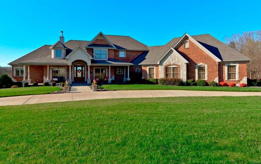 Breathtaking custom built 5 bed 5 bath home nestled on 3 acres offers 7200 sqft of finished living space. The impeccable attention to detail throughout this elegant home is unmatched. Upon entering you will immediately notice the soaring 12ft ceilings in the entry foyer, formal dining room, office with French doors, & a luxurious great room w/ a wood burning fireplace. The gourmet kitchen is complete w/ custom cabinets, center island, granite counters & stainless steel appliances. The master bedroom suite features a coffered ceiling, his & her sinks, walk in shower, garden tub, & a walk in closet. Make your way to the upper level to find 2 bedroom en-suites both w/ walk-in closets. Proceed to the lower level to find a second kitchen, theater room, fitness room, 5th bedroom, and a full bathroom. The walkout LL leads to the inground saltwater pool and fire pit. Additional Features: hand scraped wood floors, whole home audio system, zoned Geothermal system, o/s 4 car garage, & much more.