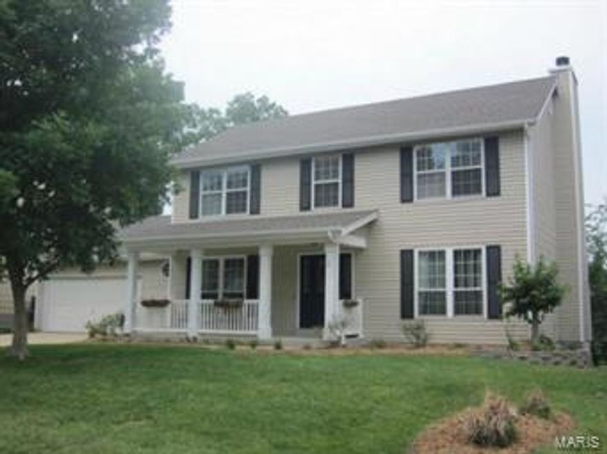 Charming 2 sty home in desirable vineyards subdivision.   This home has 4 bdrms, 2.5 baths,wood laminate in kitchen, breakfast area, MFL and 1/2 bath. Kitchen has tile backsplash, center island, newer flat top stove, wood cabinets and a french door leading to a deck. Berber carpet, brick woodburning fireplace in family rm with an expansive double picture window. Mstr bathroom has luxurious jacuzzi garden tub with picture window above it overlooking backyard with mature trees and very private. Separate shower, double sinks and double closets. Full w/o basement.  Home has 6 panel doors, clubhouse amenities are in ground pool, tennis, etc. Minutes to page ext.