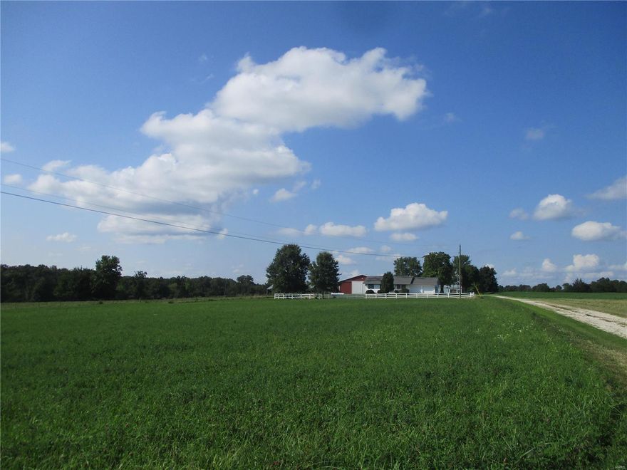 One of the best combination farms I have seen in quite a while!  If you have been searching for that perfect combination of open and woods with good soil, ponds, and great marketable timber, this is it!  Blacktop frontage makes getting in and out of the farm a breeze.  The 3 BR, 3.5 BTH ranch home is in good shape and will make the perfect weekend getaway or hunting cabin!  Two big outbuildings for your toys/equipment and miles of trails to access all parts of the farm!  Great deer and turkey sign and a bunch of Chanterelles too!  There are stone bottom creeks that provide water and travel corridors for the deer and a couple of smaller fields that will make outstanding food plots!  The timber value on this farm is strong!  Good fencing and healthy stands of alfalfa make this a farm you wont want to miss! Much of the farm has been in tillable production over the years and has only been turned into pasture and hay production recently. Schedule your private tour today before its too late!