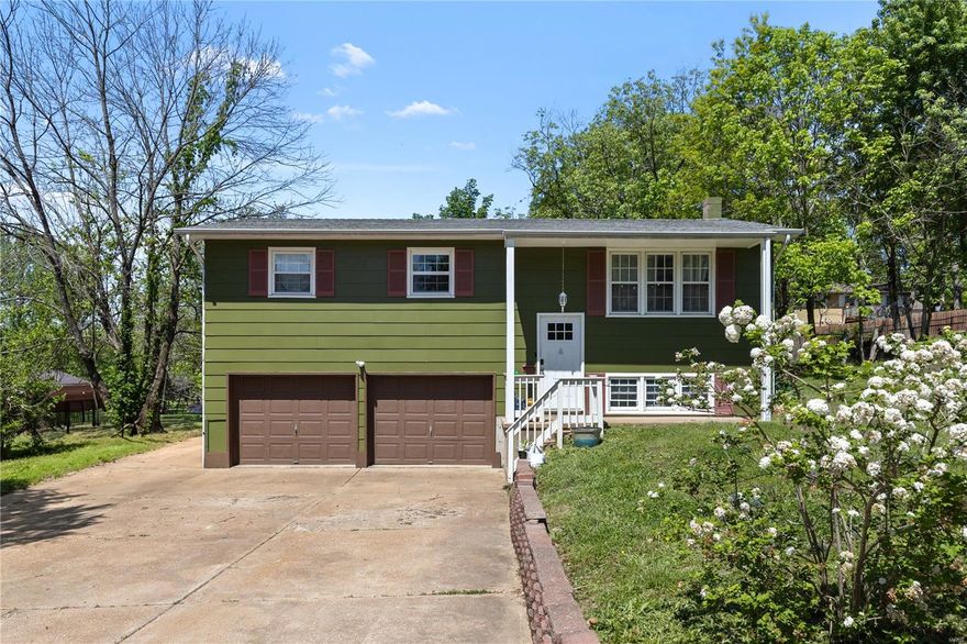 Inviting split-level home with 7 rooms, 3 bedrooms and 1 1/2 baths on a nice level (fenced) lot.  The spacious living room features lots of natural light, hardwood flooring & an open floor plan to the dining area. The dining room opens to the kitchen with a large breakfast bar featuring a new dishwasher, lots of cabinetry and all kitchen appliances are included. 3 main floor bedrooms with hardwood flooring and a newly remodeled bathroom round off the main floor. The fully fenced, nearly level, rear yard has lots of room for outdoor activities and an included kids playset. The lower level has a large family room (presently used as a 4th bedroom) and bonus nook. The 2 car garage is oversized with room for a work space and/or extra storage. Newer systems including HVAC, Water Heater, Electric Panel and Extra-Wide concrete driveway.