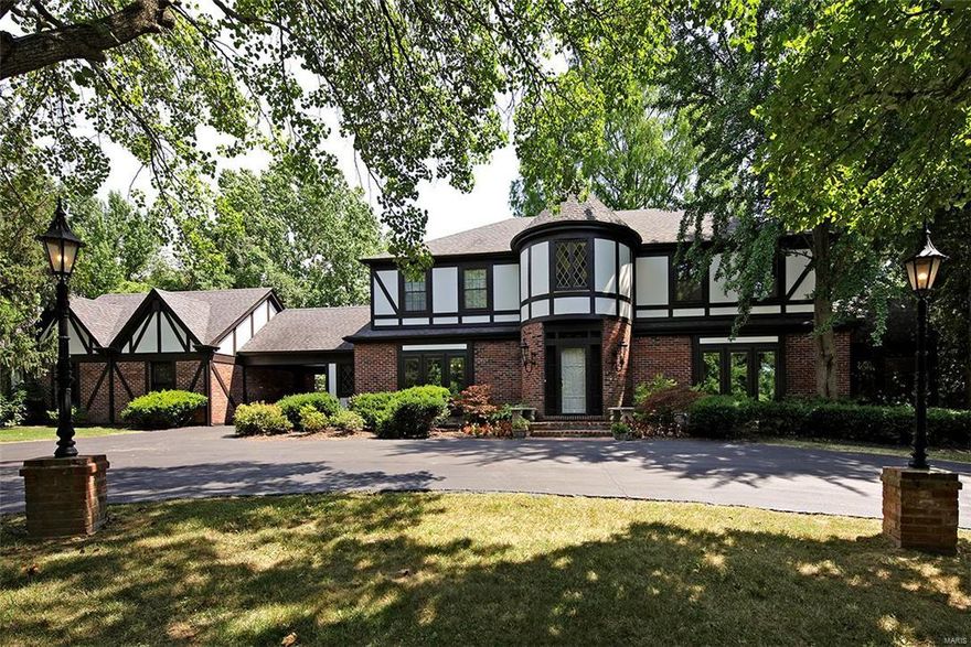 Welcome to 404 Tregaron Place, a magnificient English Tudor two story home nestled among tall shade trees at the end of a quiet cul-de-sac. This home offers 5 large bedrooms, 4 full and one half baths, first floor laundry room, and a finished lower level. It has an updated kitchen and updated baths, new carpet and paint, yet still retains it’s Old World charm with a turret shaped entry foyer, leaded stained glass windows, crown moldings and woodwork. The home offers many features including a Beam vacuum system, Pella windows with built in blinds on the front of the house, granite countertops and an abundance of closets with organizers. The large family room is perfect for entertaining with a beautiful stone fireplace and wet bar. Walk out to the aggregate patio and fenced backyard which is ideal for families with the lighted tennis court that can also be used as a sport court for games such as basketball and roller hockey. Owners are offering a home warranty.