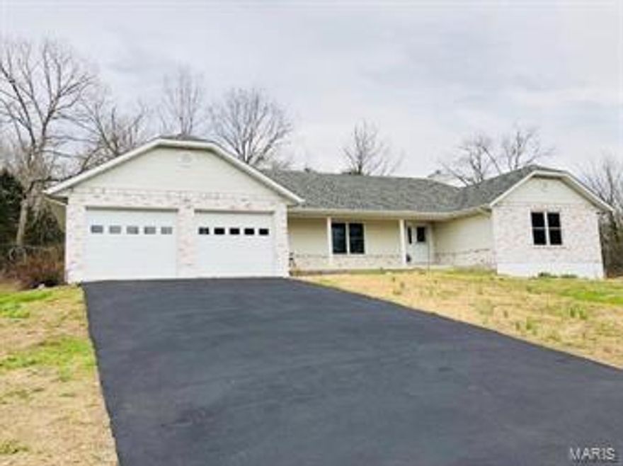 Your Adventure Awaits with this Move in Ready 1500+ sq. ft. Ranch Style Home! Come Enjoy the 7 acres of Country Living. Newly Remodeled 4 bedroom, 4 bath home. You will find many great features to this ranch style home such as vaulted ceilings, new hardwood flooring, 2 fireplaces, granite countertops, and much more! Enjoy the spacious backyard, perfect for family gatherings!