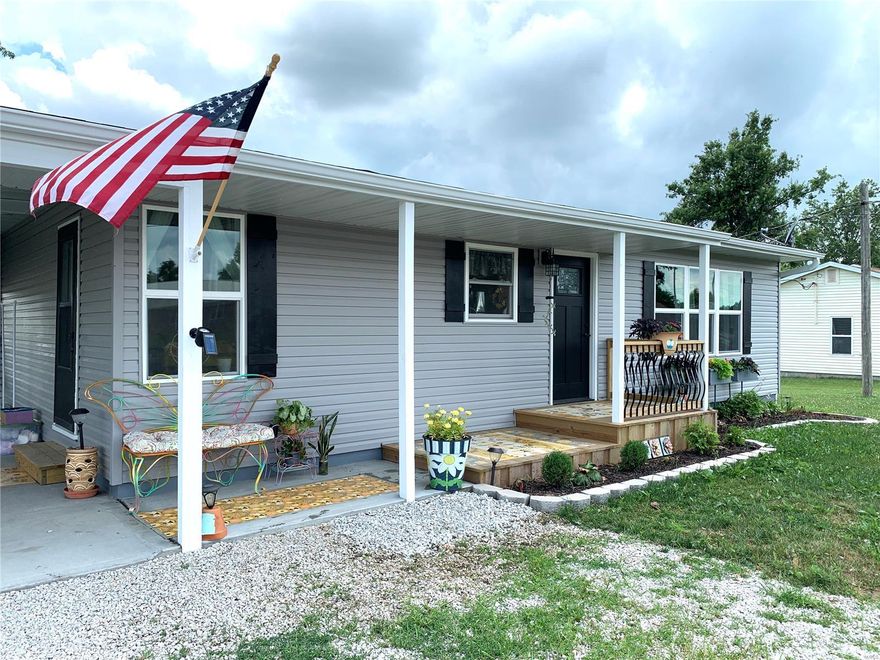 Adorable 3 bedroom home right on the edge of town. The property was completely renovated in the past year, including new kitchen, new bathroom, new flooring, new paint, new siding...You name it and it's been done! The home features an open concept with a large living room and kitchen, three bedrooms and a main level laundry room. The backyard is the winning feature of this home and has been setup like your own private oasis! The backyard features an oversized patio, which is great for those cool summer nights. There is also new vinyl fencing and the most adorable garden shed. The property backs up to farmland that provides a peaceful backdrop all while only being minutes away from the highway.