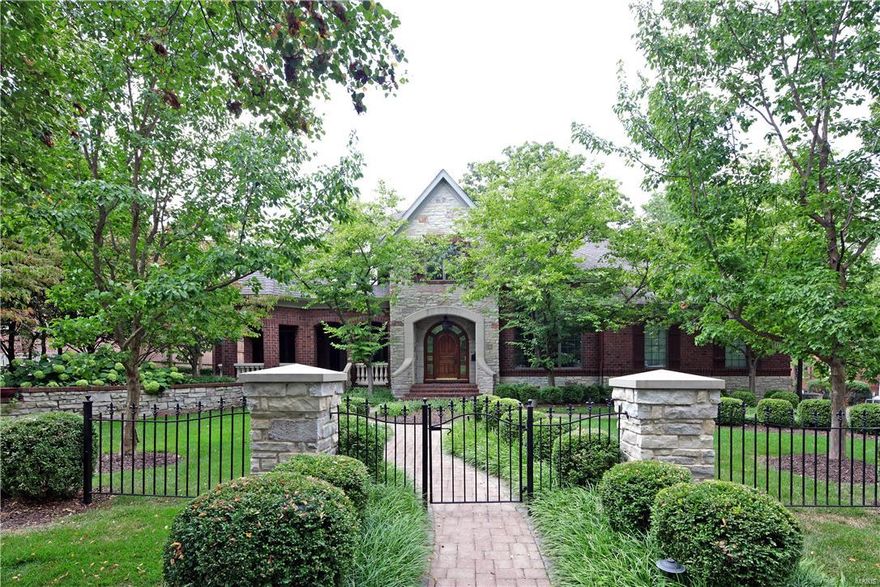 When a fine home builder creates his own residence - the craftsmanship & attention to detail is unsurpassable. 241 Linden Avenue, situated on a beautifully sized lot, in sought after Old Town Clayton - set in luxurious landscaping, represents such an opportunity. A circular driveway, brick & stone exterior & limestone balustrades & sills - sets the stage. A mahogany front door opens to the majestic entry where a circular staircase exemplifies a lifestyle of grace. A glimmer of features include the main level master suite, main level laundry & attached heated 2 car garage with lift for your 3rd car. Designer kitchen with Sub-Zero refrigerator & freezer, Viking range, pot filler & abundant counter & pantry capacity. 4 Fireplaces, rich molding, rough-in for future elevator, covered deck w/built-in Wolf grill, vented hood & waterfall feature. The 2nd floor offers 3 beds, 2 full baths & vaulted den. LL w/rec rm, 5th bedroom/office, half bath & storage room. All within minutes of I-64/I70.