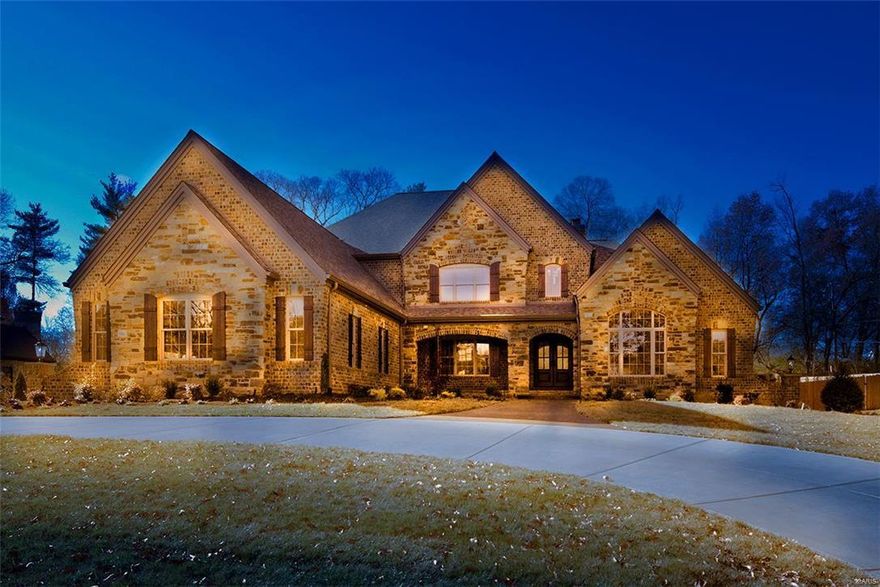 Another new DUBLEN custom just completed!  1.5 story gem on 1.4-acre level wooded site on secluded four home enclave in Ladue.  Next door to another new DUBLEN home at 1 Briar Oak completed a year ago.   Loaded with upgrades and high-quality finishes--walnut wood floors, outside covered porch, white gourmet kitchen with Quartzite center island countertop and Thermador stainless appliances, pot filler, and warming drawer.  Four sided brick exterior, fenced rear yard, first and second-floor laundry, and luxury master bath with huge walk-in shower and custom closets.  3 fireplaces, 4 -car garage.   Notice the custom cabinets and wood bookcases, step up family room on upper level, and luxurious millwork. Circular concrete driveway. Extensive landscaping. Location, quality, and new--this is a winning combination!