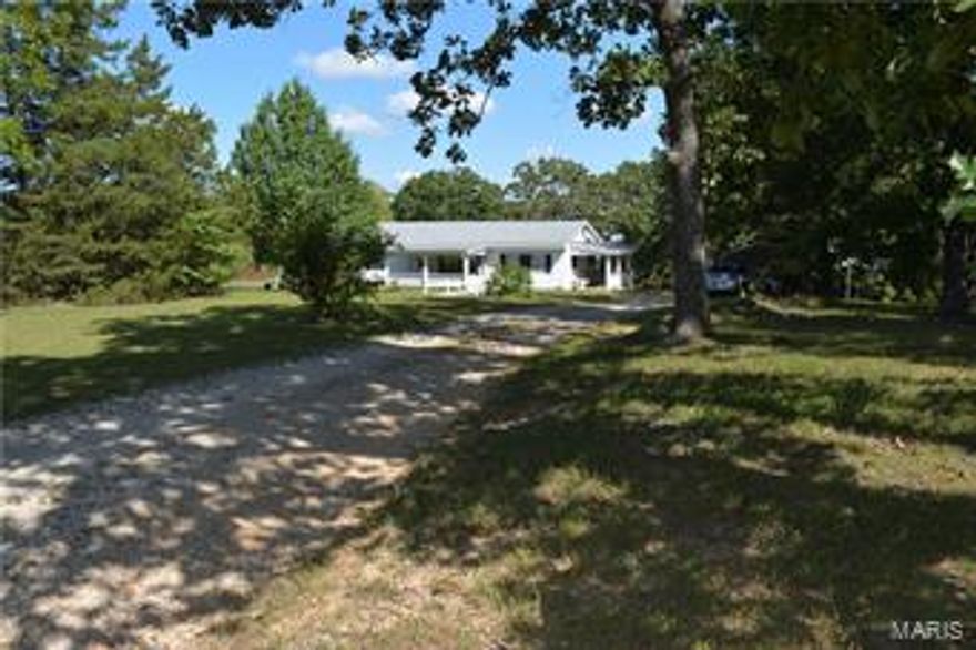 Don’t miss out on this great opportunity!! What a beautiful property! The land flows nicely & currently a wonderful mini farm is on the property. As you enter the side entrance of the ranch home, you walk into the breakfast area that is open to the den/office and the dining room. The kitchen has plenty of work space! The attic is great storage with an attic fan & plywood flooring. From the front door, the view of the large living room with built in shelves & a brick wall makes this room unique. The laundry is on the main level with an additional half bath. The home is finished off with 3 bedrooms & a full hall bath. There are multiple buildings that go with this home from the chicken/rabbit area, to the horse barn, to the workshop/storage shed. Field to the left of the home does belong to this home and wonderful for horses.  This is one of a kind and the person that calls this property home will be forever grateful for the little piece of heaven! Property is being sold As-IS. 

.