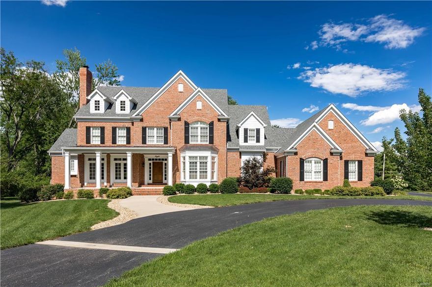 Luxurious Estate Home blended with Comfortable Family Living describes this Executive Masterpiece in The Heart of Town & Country. Impeccable detail Throughout! Masterful Design features every amenity one could want. From the Grand Entry w/ sweeping staircase to the Library/Office with built-ins & fireplace to the Luxurious Master Suite w/ Sitting area, phenomenal Master Bath, to the Ultra High-end Cooks Dream Kitchen & Fabulous Hearth Room featuring fireplace, custom built-ins, Spacious and comfortable Screened in Deck, to the Elegant Great Room with Unbelievable Bar! 4 huge secondary bedrooms each w/ their own bath, Glamorous Princess Suite too! 2nd Floor Bonus Room, to the unbelievable lower lever featuring a Custom Bar, Game Room, Bedroom, bonus play room, Family Room. Then walk out to your own private oasis of entertainment and fun! Pebble Tec Saltwater Pool with Hot Tub and Fountain.  Phenomenal Level Lot perfect for future putting green and sport court! THIS PLACE IS AWESOME!!!! Additional Rooms: Mud Room