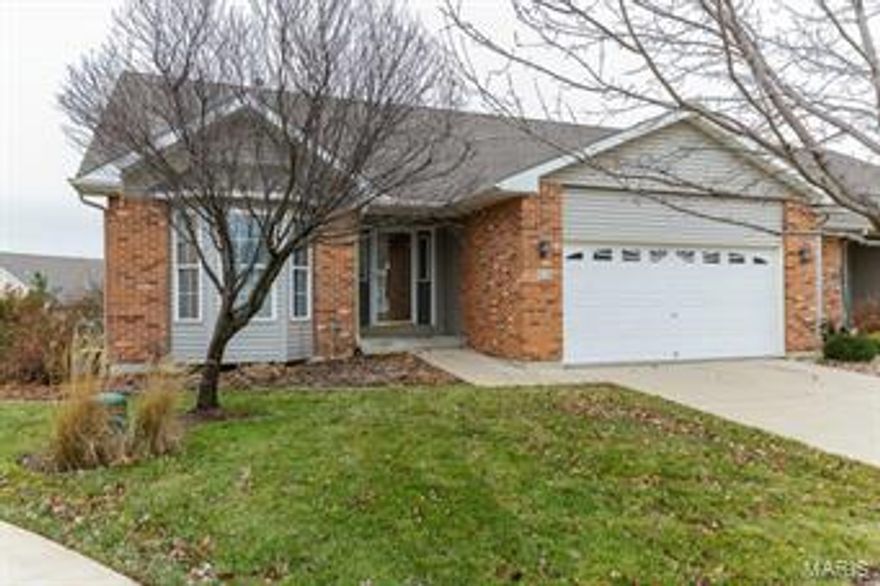 What a great location for this modern ranch style condo!  Located just off the Page Extension between Harvester and Jungerman, this home has excellent access to shopping, off Jungerman and Wood stone, the post office, and has great access to both service roads for Page, McClay and all the larger roads in the area.  Some of the features include a hardwood entry foyer, vaulted ceilings in the great room, breakfast room and kitchen, main floor laundry, oversized two car garage, large master bedroom suite, four bay windows, and updated kitchen, and screened/glassed in patio.  The look-out basement is finished with the third bedroom & bathroom, a recreation room and three separate storage rooms.  This condo group is well set up with plenty of space between buildings , and all of these outside units are two unit buildings, so you have only one adjoining neighbor.  You will love this location and the set-up for this condo. Location: Ground Level, Suburban