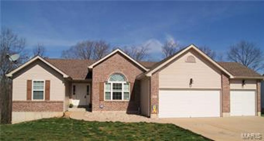 WELCOME HOME!  This Huge 3-car garage, 3-bdrm, 3-bath Divided bedroom plan with 2 MASTER SUITES!! Wood Floors, Vaulted ceiling in great room with ceiling fan, woodburning fireplace with glass doors and blower, Upgraded kitchen cabinets, breakfast bar, pantry & plant shelves. The wood floors are beautiful and the separate formal dining or Office space room is beautiful with huge upgraded window and chandelier.  The larger master suite is the depth of the home with huge master bath and linen closet. Main floor laundry off kitchen.  12x12 screened porch and additional 12 x 15 maintenance free deck overlook the woods and pastures. The finished lower level includes a walk-out, recreation room, Huge WET BAR,  half bath, storage room and possible sleeping area. The home has all the perks you could want incl. central vac system, beautiful light fixtures & ceiling fans and so much more! Located on a level lot in a Cul-de-sac with street lighting. Seller Motivated Subject to lender's approval! Some Accessible Features