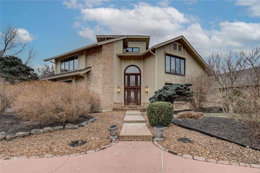 Custom-built 1½ story situated on 10.24 private acres in beautiful Equestrian Community. Wildwoods hidden gem w/private gated entrance to your new home! Circular drive. 2 story entry greets you w/marble floors  Greatroom w/soaring ceilings, fireplace, lots of windows overlooking your oasis. Lrg Sep DR, great for entertaining! Updated Kitchen w/high end stainless appliances, Sub-Zero frig, warming drawers, 2 Thermador ovens & Thermador gas cooktop sure to please the chef in the family!  Deck off Kitchen. Mastersuite  w/lrg walk-in closet surrounded by windows w/spectacular views.  Lrg master bath w/sep shower & jacuzzi tub. Office just off master. 2 lrg BR upstairs w/full bath. LL has Family Rm w/fireplace, 2 adtl BR, 2 full baths, wet bar & kitchenette, great in-law suite!  Inground pool w/lrg pool deck & pool house/gazebo. Private stocked lake. Newer roof, newer HVAC systems & water heater. 3 car side garage, Rockwood Schools! Best Lot in sub w/lake views & amazing sunsets