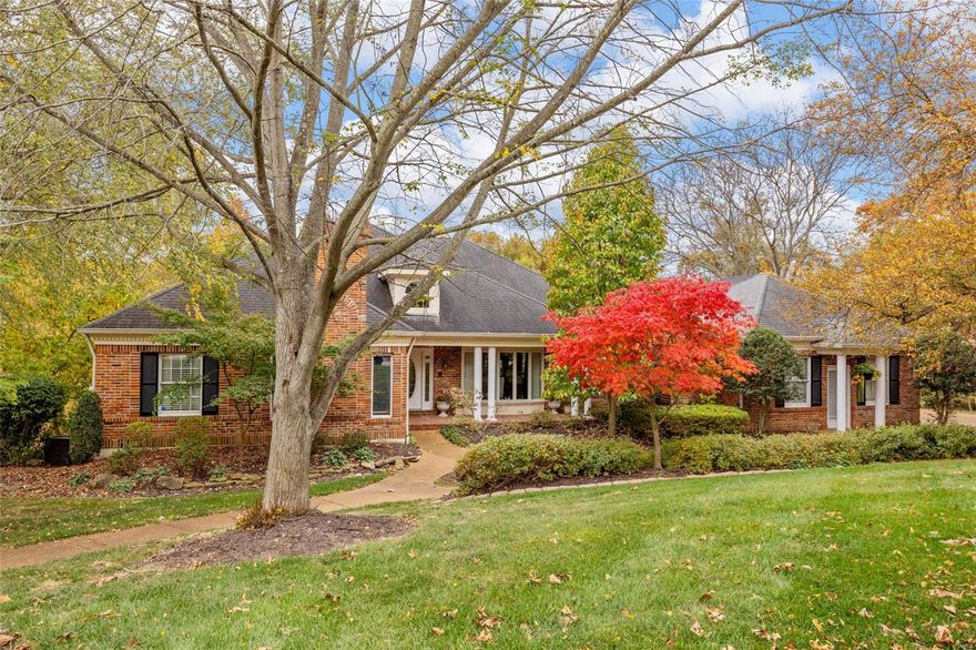 Gorgeous ranch home on premium wooded lot w lake views situated on a cul-de-sac in desirable Wildhorse Subdivision. 
Approximately 1 acre lot & 4200 Sq. Ft. of living space. Outstanding highlights include: 4 sided brick exterior, 4 full masonry gas fireplaces & double decks w Pergola on the top deck. Remodeled vaulted kitchen has a center island, stainless steel appliances, double oven, built-in microwave & granite countertops & adjoins the breakfast rm & hearth rm. 3 bedrms on the main flr, two connected by Jack & Jill bath. The Master bedrm boasts a vaulted ceiling, bay windows overlooking the lake & large custom walk-in closet. Remodeled luxury master bathrm w free-standing spa-jetted tub & large separate shower. Office w remodeled bar & wine refrigerator. Prof. Finished lower level has family rm w. fireplace, large bedrm w walk-in closet, Updated bath & beautiful bar/kitchenette & exercise rm. Main flr laundry w built-in pantry. Enjoy the Subd. pools, tennis cts. & walking trails.