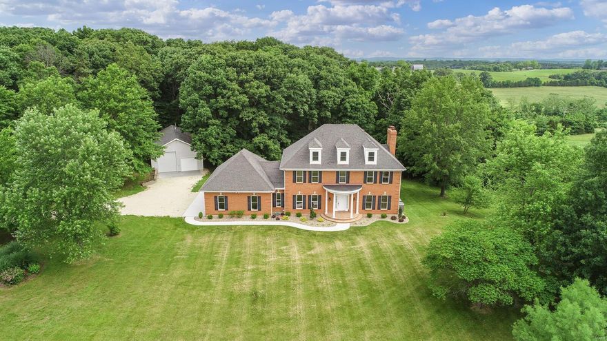 Elegant 2 1/2 story home is situated on 43 +/- acres w/GORGEOUS PANORAMEC VIEW ! GREAT FOR HORSES/RECREATION/FARMING/WEEK-END GETAWAY OR RESIDENTIAL! Land is mostly open pasture & some scattered woods. 28 x 48 detached outbuilding w/100 amp service, car lift, woodstove & concrete floor. Stepping thru the doorway of this beautiful home entering the main level offers a splendid foyer, formal living room & separate dining room. Kitchen w/custom cabinets, quartz tops, pantry, backsplash, stainless steel appliances & breakfast room. A great room w/wood burning fireplace, leading to large deck. Laundry room & 1/2 bath. Upper level finds you Master suite w/walk-in closet, tub/separate shower & dual sinks, 2 add'l bedrooms, office & hall bath. 3rd level offers a spacious rec room, office etc.. Walk-out lower level features a family room w/wood burning insert fireplace. mud room & full bath. 3 car oversized garage & 1 tuck under garage. MUST SEE THIS PRIVATE SCENIC COUNTRY SIDE PROPERTY ! Additional Rooms: Mud Room