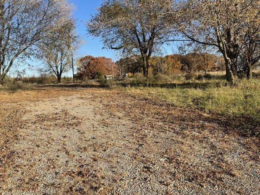 Versatile lot, only a mile from Grovespring, MO. 20 miles to Lebanon and 20 miles to Marshfield. Fenced on two sides,
this land has a large slab for a shop building or business already in place. There is 3 phase power available should you want to open a business that needs this kind of power.  Power is running 5.5c/kWh from the nearby substation which has 10MW of available power. There was a home and a mobile home, which were torn down but the wells (3 total) and possibly septics are still in place. Seller does not know if these still function. There are a few trees to provide some cooling and privacy, but enough open space to utilize it for a number of things; hobby farm, gardens, greenhouse, business buildings, storage buildings, homes, rental homes, whatever you want. This property consists of two lots to be sold together.