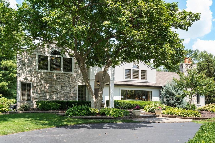 This modern California-inspired home is the embodiment of casual elegance! Embrace a relaxed lifestyle where friends come as they are, kick off their shoes, and enjoy nights of wine & appetizers around the fireplace while listening to the relaxing sounds of the water fountain. This exquisite home was meticulously expanded and renovated, boasting many of the features you find in New Construction. Incredible kitchen with massive island, state-of-the-art appliances, custom cabinetry, and triple-thick marble countertops. Open to the impressive family room, with 15’ ceilings and oversized sliding glass doors leading to the loggia with outdoor kitchen. Main-level Primary Suite with dual walk-in closets and spa-like bath with private water closet. Multiple office spaces for those working or studying. The open and flexible floor plan caters to multi-generational living, including a 1bed/1bath apartment suite with private exterior entrance. This one must be seen in person to appreciate!