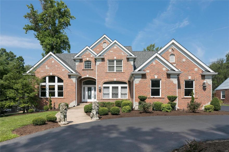 Terrific brick/stone 2 story home with 4150 sq ft of living space on a level .89-acre lot in Town & Country. Paneled office, great room with floor to ceiling windows flanking gas fireplace, large eat-in kitchen with granite countertops, center island, breakfast area in bay window, opens to hearth room with 2nd fireplace. Bonus area opens to patio & view of lush yard & trees. Laundry on the main floor, 3 car garage, circle drive and a brand-new roof! Main floor master suite with large bath & walk-in closet. 3 Additional upstairs bedrooms plus 2 baths. This house is a five star! County Records of square footage may be inaccurate.