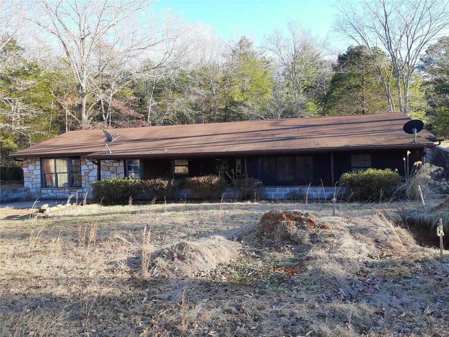 This three bedroom, two and half bath earth contact home sits on .94 acre in an awesome location just across the highway from Eagle Sky of the Ozarks between Piedmont and Patterson, MO.  This home needs a little TLC but has lots of potential.  There is a two car detached garage/workshop, mature shade trees, covered front porch and more.  Home is located near Sam A Baker State Park, St Francis river, Clearwater Lake and Black River, Wappapello Lake and more Ozarks attractions. SpecialListingConditions: Short Sale