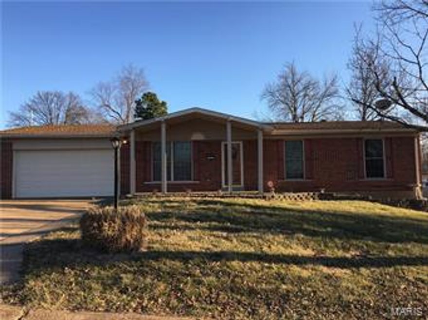 This home is nestled on a corner lot with a nice fenced in yard. This home boasts curb appeal. This is 3 bedrooms on main level with 1 1/2 baths. The Master Suite offers a 1/2 bath. The lower level could offer mother in laws quarters or a great rec/family room for your additional entertaining needs which includes a walk out basement. Highly desired open concept in main living area with main hall floor plan. Awaiting your personal touches. Minutes away from Interstate HWY 55, schools, shopping and local cuisine. Must see today!!!