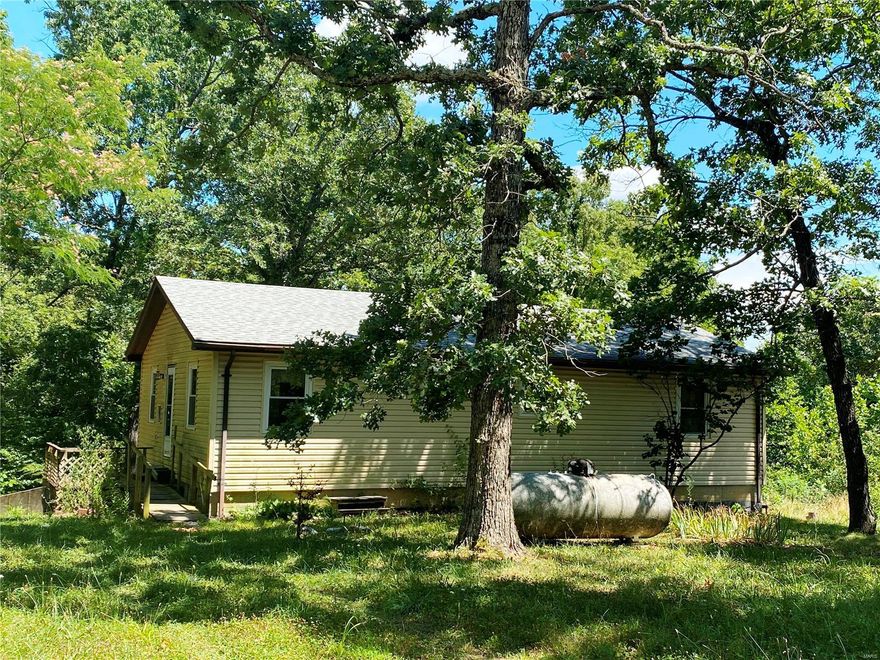 This could be your little piece of heaven, just needs some TLC. 3 bed 2 bath on 5 acres with walk-out basement. Home was fully renovated when last sold in 2013. Well built home. quiet area, pretty landscaping. land is about 1/2 open
Basement has 1/4 bath in utility area. Could be 4 bedroom. with family room also. Home sells "as is"