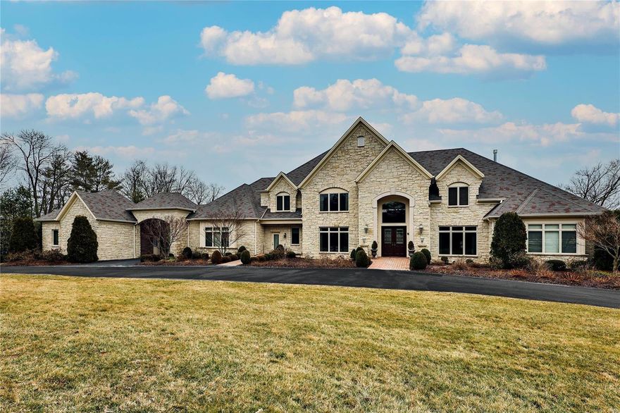 Pristine 7,000+sq ft home on 2 acres in the heart of Ladue. Built by Rehnquist Homes in 2007, this 7-bed, 10 bath home offers easy access to Old Warson Country Club. 10' ceiling heights throughout. Gorgeous 2-story Foyer w marble floors, 2 coat closets & custom wainscoting. Great Room features cathedral ceilings, gas fireplace, wet bar, layered moldings & stunning wall of windows overlooking lovely patio & expansive rear landscape. Wood paneled Library w built-in bookcases. Formal separate Dining Room w tray ceiling. Gourmet chef's Kitchen w center island features Wolf, Subzero & Bosch appliances & walk-in pantry. Breakfast Room opens to Family Room w exposed beam, vaulted ceilings & beautiful stone fireplace. Additionally, the main floor includes the Master Suite, Laundry Room, & additional Bedroom. Upper Level offers 4 additional Bedrooms & Laundry Room. 2,300+sq ft finished Lower Level includes 2 full baths, Bedroom, RecRoom, ExerciseRoom, & walk-out access. 5-car garage. Elevator. Some Accessible Features