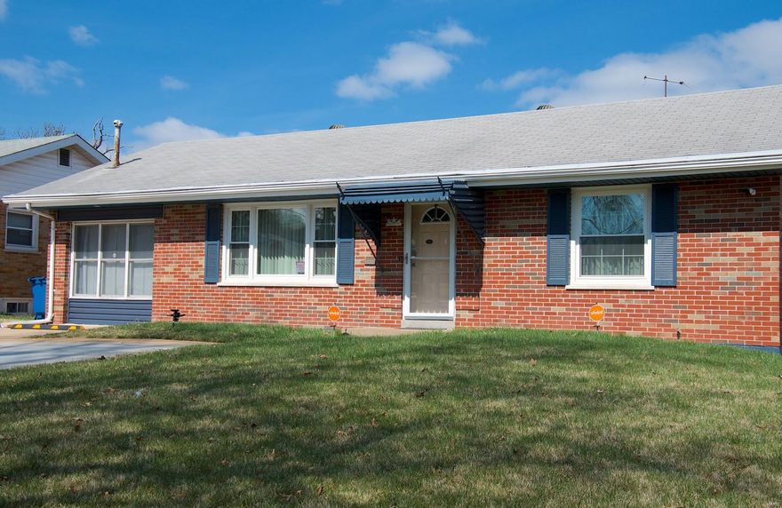 Incredible opportunity for an outstanding value in this beautiful 4 bedroom, 2 bath brick ranch home.  You will love this beautiful Cool Valley subdivision, so convenient to amenities and highway yet tucked away and backing onto an open field.  The home feautures:  beautiful wood flooring, double concrete driveway, mostly upgraded insulated windows and a partially finished basement with a second bathroom.  This is a real family homestead and an incredible price. The home is lovingly maintained and there is room for you to add your own touches.