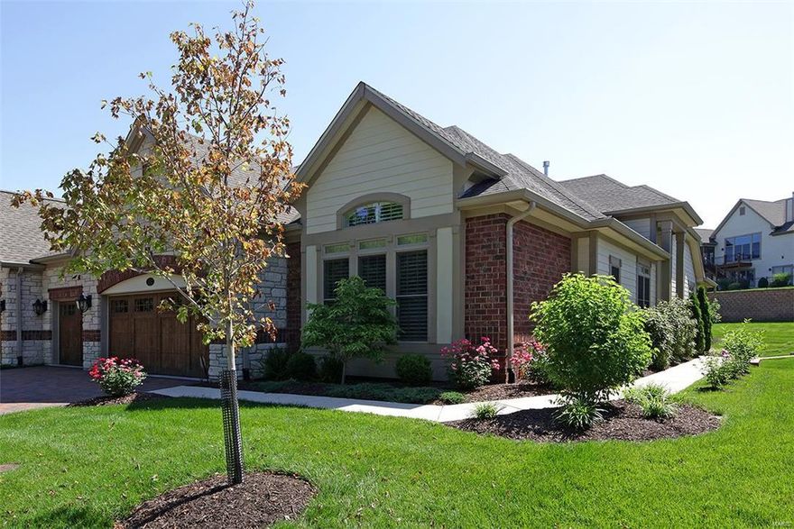 One of the premier villa homes in this prestigious development!A beautiful like new home that features the highest end finishes, open spaces,very high ceilings,and large windows.The LR is elegant with fireplace, special millwork and cabinets with glass doors, wood floor.A large music room may also be a den on the main level.Large Kitchen is equipped with a 5 burner Wolf range, two wall ovens, and a Sub zero, Master bdrm is so restful with a lovely view.Master bathroom is 17x7 and has a 9x6 walk in shower, separate oversized toilet area, plus cust cabinets for linen and towel storage.Also a 12x7 dressing room plus a large walk-in closet. Second bedroom on main level is also large and has a private bath..The 3 season porch is so inviting for morning coffee or just taking in the view of the pond and listening to the birds.LL features a GRM that puts the fun into family gatherings.There are two additional bedrooms,two baths.Elevator is handy for taking bulky items to the storage area. Additional Rooms: Sun Room, Workshop/Hobby Area Location: End Unit, Ground Level