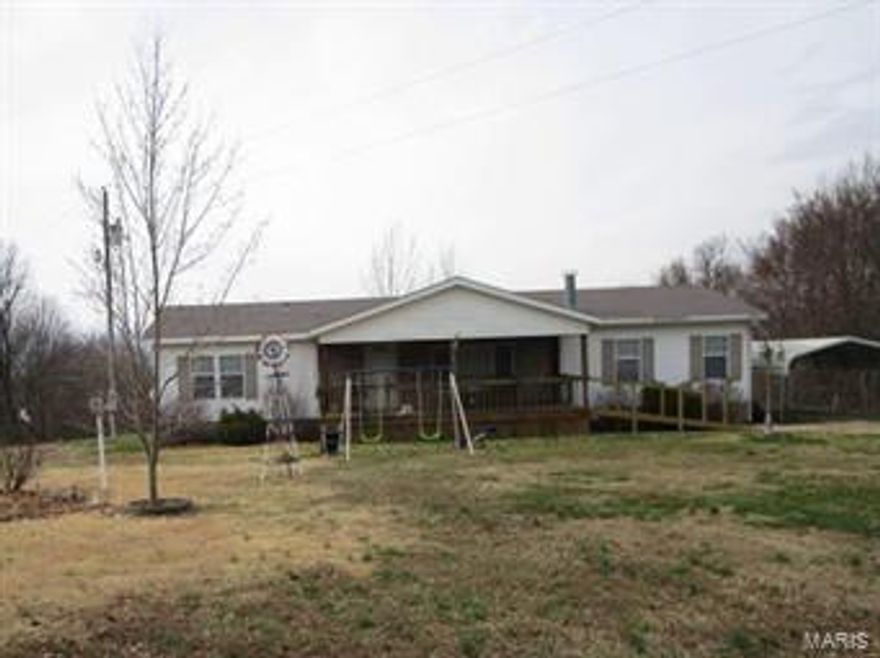 Nice and quite peaceful country living with room for the kids to explore and enjoy life. Manufactured home is nestled on little less than 10 acres. Two outbuildings (16 x 20 and 8 x 10).