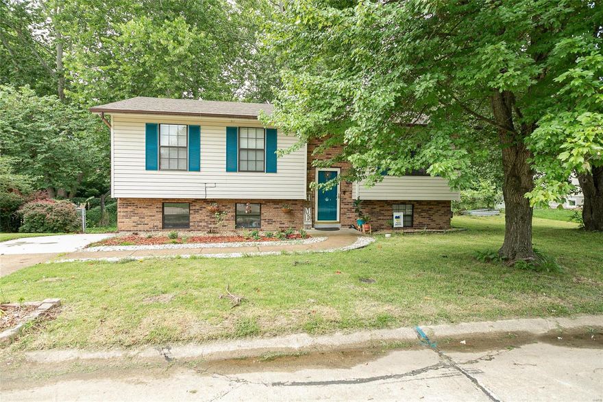 LOCATION, LOCATION, LOCATION! This home is in the heart of Arnold with very quick and easy access to 141 and 55. Enjoy this 3 bedroom split level home with hUGE flat backyard! Beautiful wood french doors lead out to the deck with a great view! Finished lower level with a half bath and laundry room! You'll fall in love with the space that this home has to offer. This won't last long!