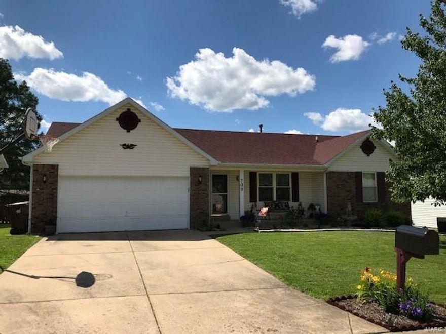 Must See!  Will not last long with location.  This fantastic spacious ranch offers 3BR, 2 Baths, large great room & 2 car OVERSIZED garage. New flowers & bushes front and back, with a gazebo on the main deck, above-ground pool with adjoining deck, new pump-May 2019. Open floor plan is great for entertaining family & friends enhanced by the brick gas fireplace. Home boasts updates, including newer SS kitchen appliances.  Fresh paint in popular colors, updated kitchen with newer counter tops & new wood flooring in 2 bedrooms. New lighting fixtures throughout. Newer architectural roof.  Both bathrooms have new shut-off valves, new sink/cabinets vanities & fixtures in hall bath, master bath has new fixtures, energy saving shower head, cabinet & ADA energy saving toilet. In ground Sprinkler system.  The unfinished basement has installed shelving & work bench.  Cul-de-sac street nestled in the Highly rated Fort Zumwalt School District. Some Accessible Features