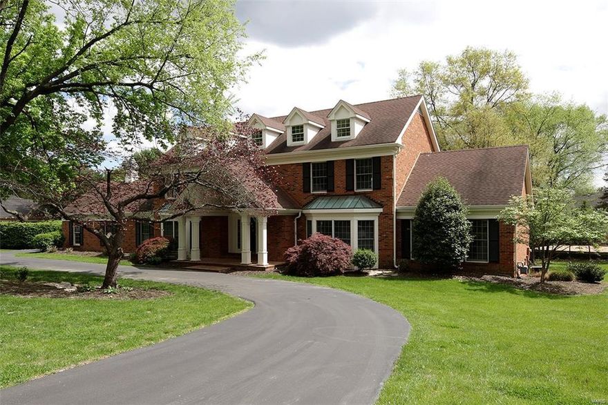 Come take a look at this fabulous house with new price and pictures.
Perfect setting for this large,brick traditional home.  The open floor plan provides space for all your living & entertaining desires.  A newer beautiful deck with large stone fireplace is ideal for outdoor gatherings in warm or cold days.  The kitchen is updated with all of today's wish list:  granite counters,large island,newer cabinets with lightening feature,prep sink,6 burner range, & sub-zero refrigerator.  The master bath has heated flooring & a large shower with multi shower heads & wall jets.  The LL is a walkout and has large windows that brings in lots of light.  LL includes a full bath,bar area,separate TV /rec area, and another bonus room.  This house has so many features it is a "MUST SEE"!