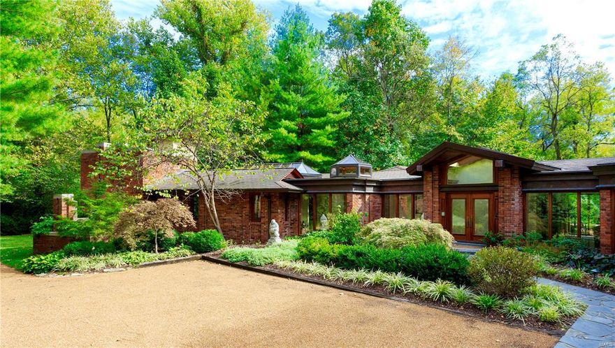 A quiet sense of recognition occurs when you come upon a special place. Such is 215 South Warson Road. Rarely, does a property become available that appeals on every level. This home, with its sophisticated aesthetic, could easily be featured in Architectural Digest, yet offers an opportunity for the investor who recognizes quality and value. Turning onto the private drive, you are summoned by this retreat as a feeling of serenity envelopes you. Entering the home you become immediately aware of the uncompromising quality of construction. The rear of the property with pool, spa and gardens offers a retreat that few will ever be fortunate enough to enjoy. Sited on 1.2 beautifully landscaped acres, it could not be replicated for anywhere near the asking price. The owner has nurtured her retreat. Now retired, she looks forward to the next chapter in her life and offers this extraordinary opportunity to the next keeper of this kingdom. Surrender, and come home to your Sanctuary in Ladue.