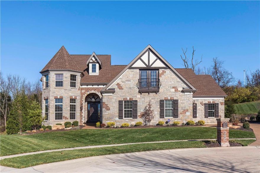 Spectacular 1.5 Story home nestled on a premium cul-de-sac lot! This custom built home boasts incomparable luxury w/the highest construction standards throughout.  The brick/stone front exterior w/turret & professional landscaping welcome you into the grand entry open to a formal dining rm & 2 story great room w/curved wall of windows.  Spacious breakfast room & hearth areas w/fireplace adjoin the gourmet kitchen w/custom cabinetry, center island, copper farmhouse sink, walk-in pantry & high end appliances. The main fl master suite has his/hers walk-in closets & luxury bath w/bubble tub & custom shower.  The upper level provides a large loft/family room w/built-ins, 3 bdrms, 2 sharing jack 'n jill and 1 w/ensuite bath. A fully finished 5-car garage w/o/size doors, bar area, storage & half bath offers a great place for entertaining, while the expansive/heated covered back porch w/fireplace & outdoor kitchen provide exceptional views of the private backyard.  Convenient Fenton location! Additional Rooms: Mud Room