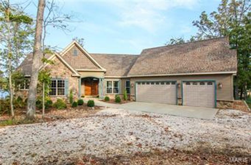 The expansive view of 236-acre Alpine Lake will take your breath away as soon as you enter this luxurious 4-bed, 3-bath fully furnished custom home. The great room features a gorgeous stone fireplace, soaring vaulted ceiling and gleaming hardwood floors. The kitchen is a cook's dream with its massive stone-faced island featuring a beautiful farmhouse sink and plenty of counter space, custom cabinets and stainless steel appliances. The breakfast nook and separate dining area allow you to enjoy scenic backdrops at every meal. Enjoy fresh air and lake vistas from the screened-in porch or deck. Wake up to the sun glistening off the lake in the roomy master suite with huge master bath. Two additional bedrooms in the lower level and large recreation area provide plenty of room for family and friends. All lead to a beautiful patio with pavers, gorgeous landscaping and gentle slope to the fabulous private beach area and fire pit. Geothermal heating and cooling add to year-round comfort. Additional Rooms: Mud Room