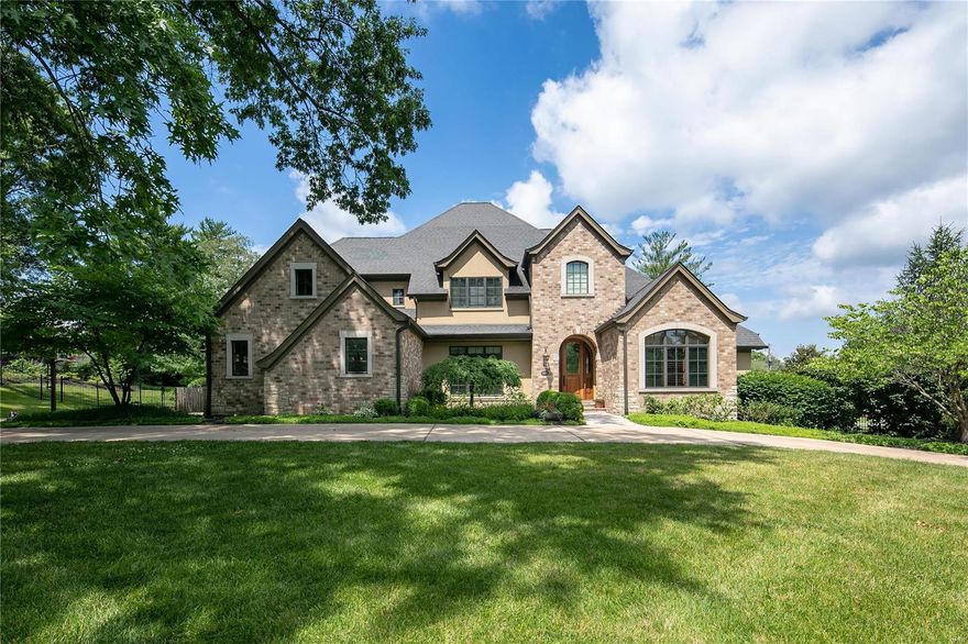 Traditional Country French home in the sought after Private & Gated Bryn Wyck subdivision.  This wonderful 12 year old home is on almost an acre of land with its beautiful back garden and Salt water Pool.  Open floor plan lets the sunshine beam through the amazing floor to ceiling windows in the living room. 5 bedrooms & 5.5 bath with main floor master overlooking garden/pool area, his/her closets, en suite bathroom, spa shower, jet tub and double vanity. Main floor has separate dining room, bar area, and wine room.  Large eat in kitchen, custom cabinetry, Wolfe Range, with a separate warming draw.  Kitchen opens into the hearth room which is so cozy & hosts the 2nd fireplace with beautiful crystals that light up. Main floor laundry room and 2nd floor laundry area.  Three bedrooms upstairs all en suite with custom fit closets & draperies. Fifth bedroom in basement w/ separate full bath & walkout, wet bar & sauna. Outdoor fireplace in garden great for pizza nite!  See list for more! Additional Rooms: Mud Room, Wine Cellar