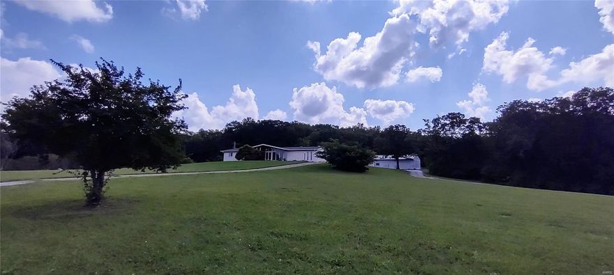 11+/- ACRES ZONE CC2 - this is a find -with rolling acres - public utilities available - across from Northwest High School.  Would be perfect to build condos or rentals!  Also has street frontage on three roads, Local Hillsboro/Cedar Hill Rd/ Fawn Location: Corner Location, High Traffic